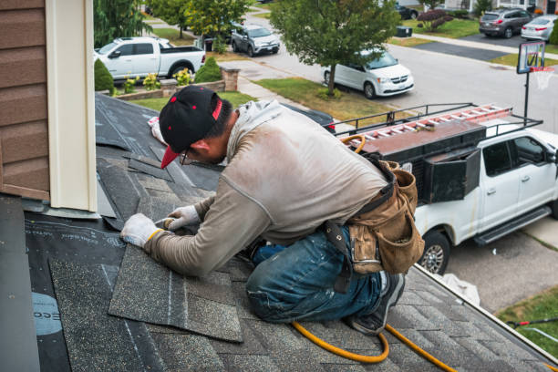 Professional Flat Roof Repair technician working in Clute, TX